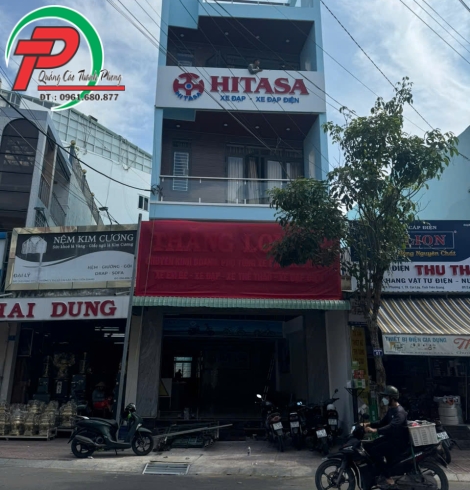 Bảng hiệu cửa hàng xe máy Thăng Long